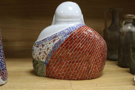A large Chinese famille rose figure of Shou Lao and a similar figure of Budai tallest 61cm
